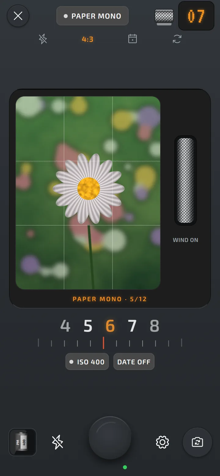 Film-camera viewfinder with thumb-wheel wind-on
